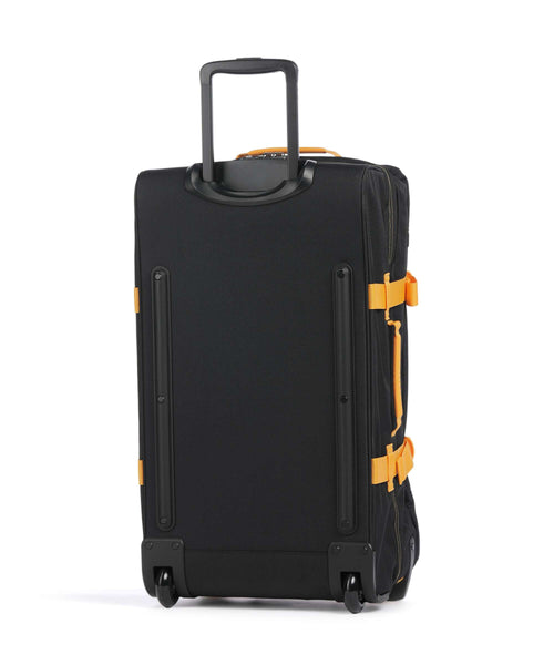 Eastpak Tranverz M Travel bag with wheels kontrast mango